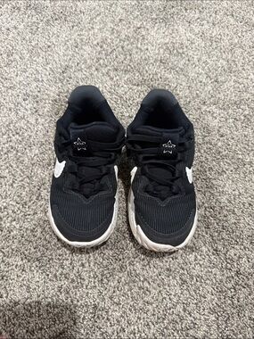 Black and White Nike Kids Athletic Sneakers
